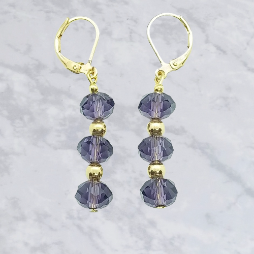 Aretes con cristal Morado en chapa de oro 22k