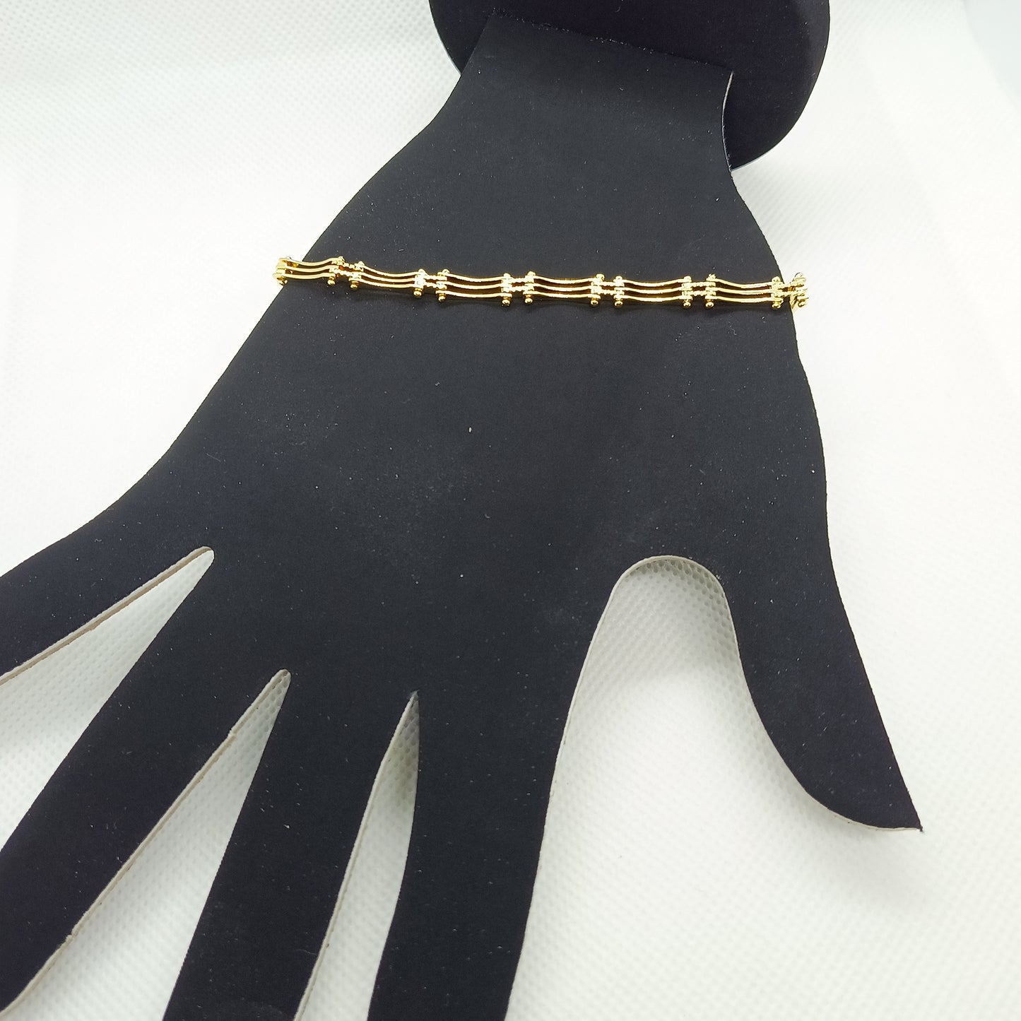 Pulsera estilo boleado en chapa de oro 22k