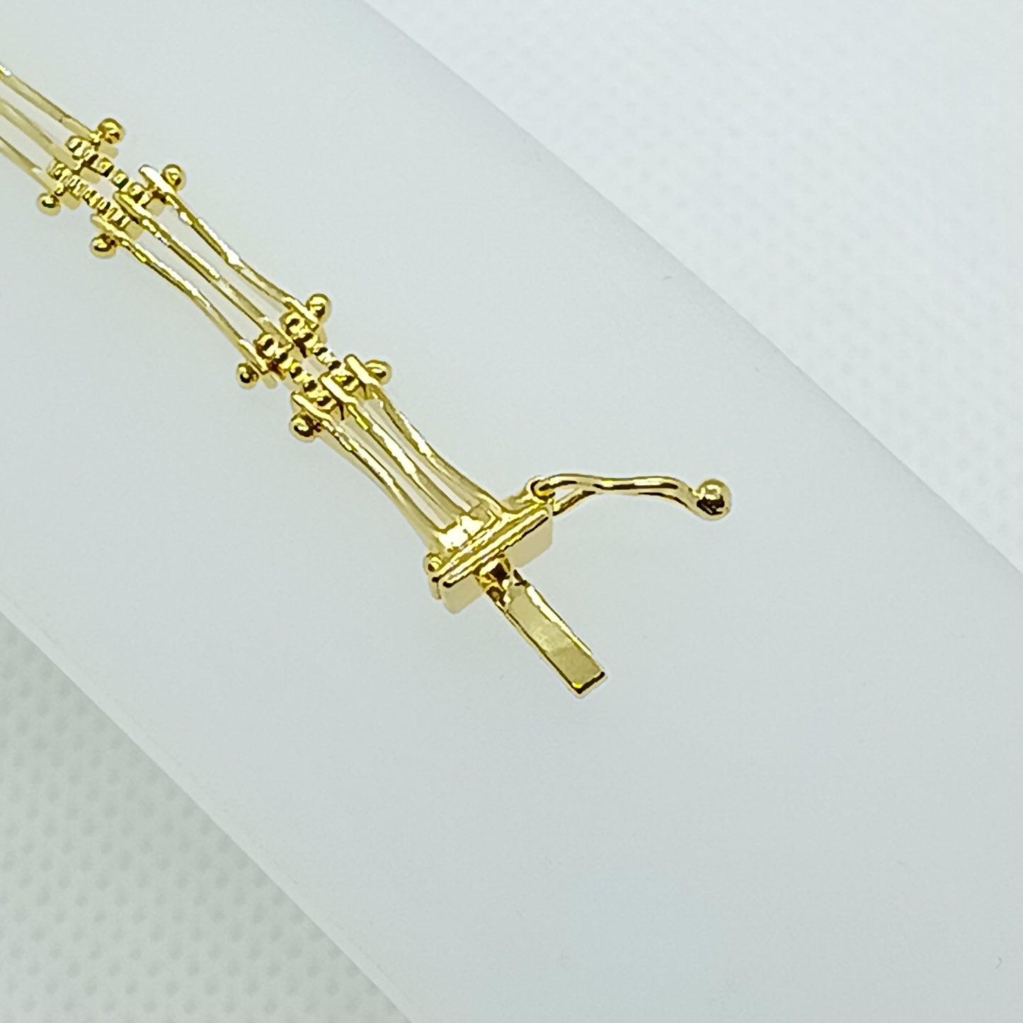 Pulsera estilo boleado en chapa de oro 22k